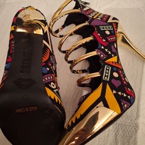 Red kiss spiked pumps